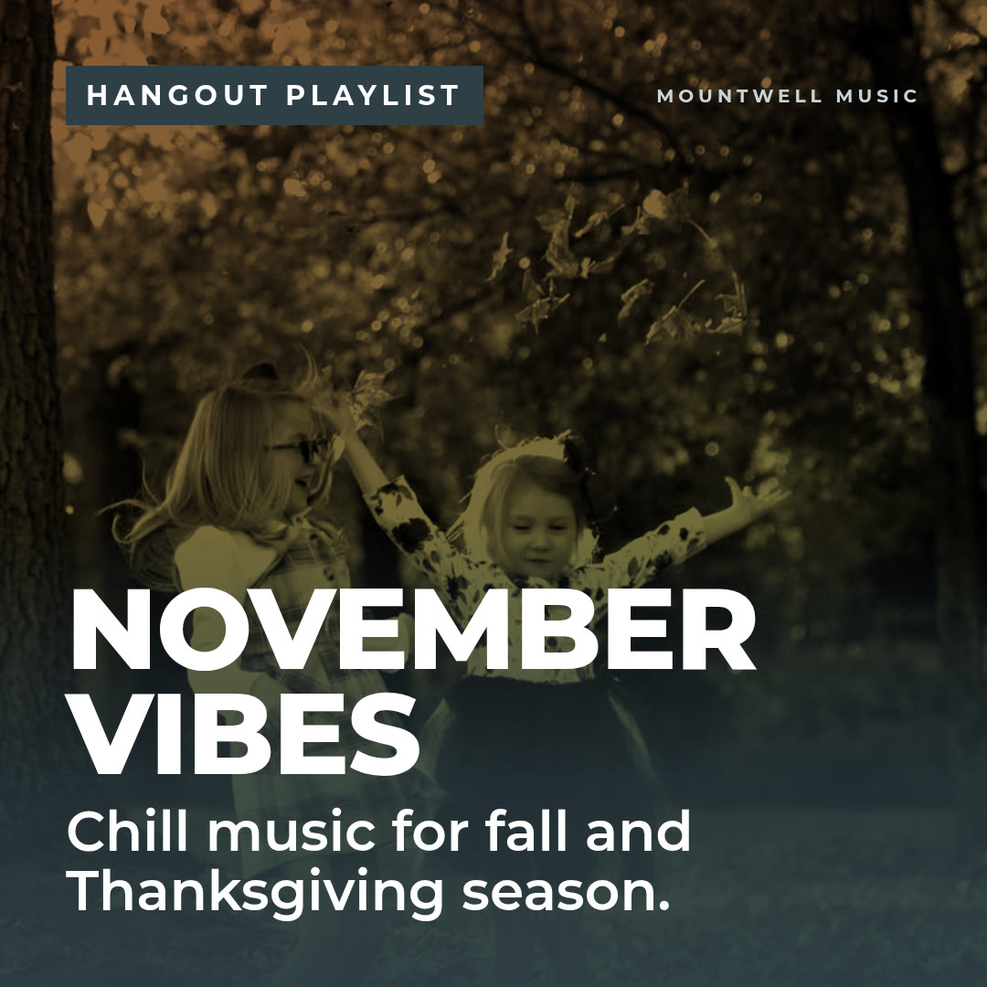 November Vibes playlist cover: two young girls tossing autumn leaves in the woods, tinted amber, with the words Hangout Playlist, November Vibes, Chill music for fall and Thanksgiving season.